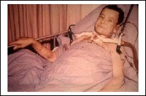 Post-op patient in hospital bed